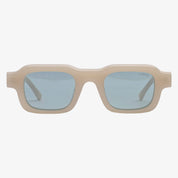 Occhiali da sole DOLLA, montatura bianco latte, lenti blu, vista frontale