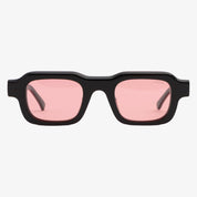 Occhiali da sole DOLLA, montatura nera, lenti rosa, vista frontale